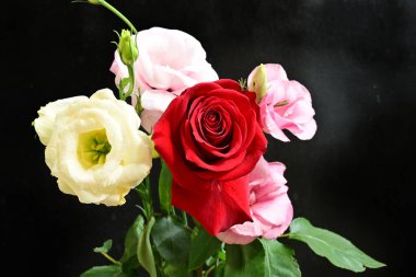 bouquet of rose and eustoma flowers, close - up 