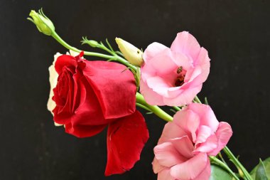 bouquet of rose and eustoma flowers, close - up 