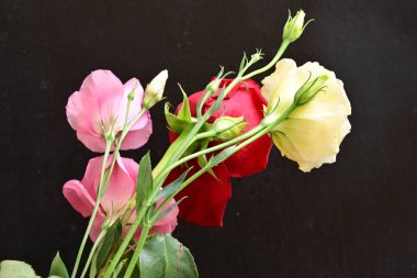 bouquet of rose and eustoma flowers, close - up 