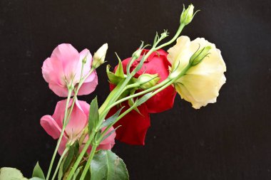 bouquet of rose and eustoma flowers, close - up 