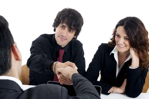 Young married couple at desk in a business meeting — Stock Photo, Image