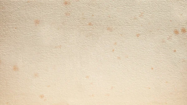 Papel bege espesso envelhecido pelo tempo com manchas na superfície — Fotografia de Stock