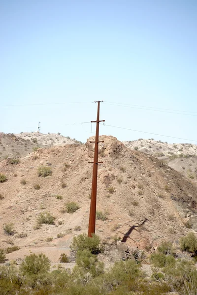 Elektrický pól v poušti — Stock fotografie