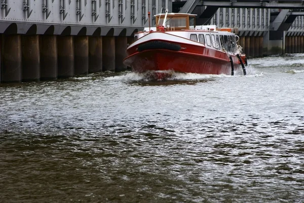 Passenger boat in the port channel — Stock Photo, Image