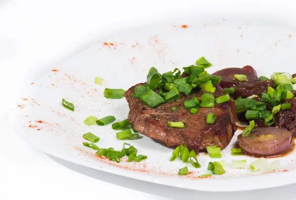 Grilled pork steak on white plate. — Stock Photo, Image