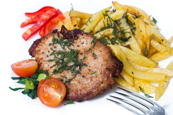 Filete de cerdo a la parrilla en plato blanco . —  Fotos de Stock