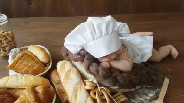 Five Month Old Boy Dressed White Baker Suit Cap Lies — Stock Video