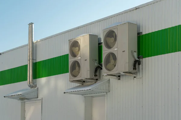 Industrial air conditioner on the building facade