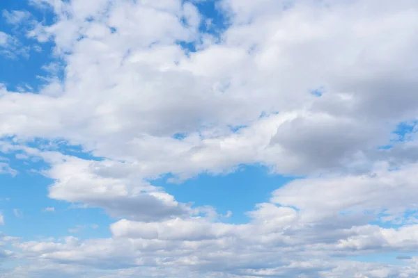 Blue sky with cumulus clouds horizontal photo