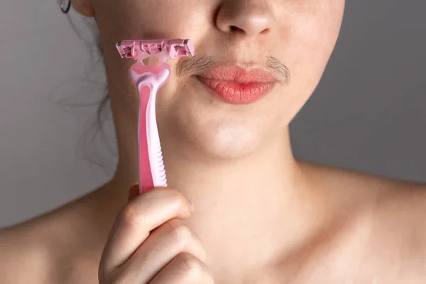 Young Woman Mustache Winces Touching Her Face Razor Concept Getting — Stock Photo, Image