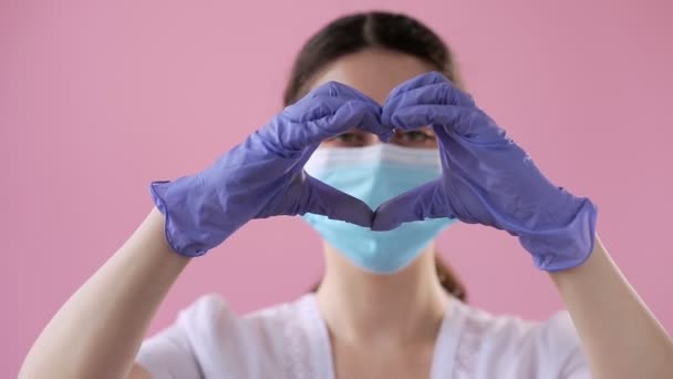 Portrait Young Female Doctor Medical Gloves Mask Shows Heart Sign — Stock Video