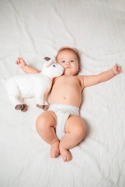 Cute Baby Diapers Lying White Sheet Plush Toy View Top — Stock Photo, Image
