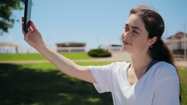 Portrait Young Caucasian Woman Who Takes Selfie Smartphone While Relaxing — Stock Video
