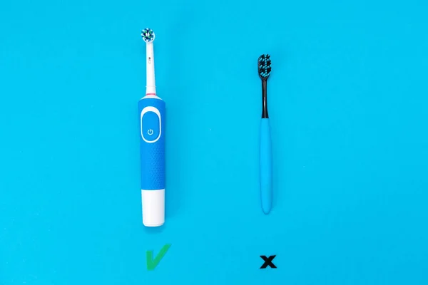 Electric Toothbrush Toothbrush Blue Background Flat Lay Concept Comparing Personal — Stock Photo, Image