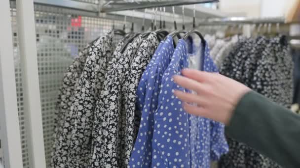 Woman Sorting Hangers Dresses Store Hands Close Real Time Concept — Stock Video