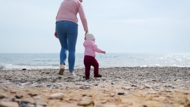 Mother Leads Baby Arm Sea Outdoor Walks Real Time — Stock Video
