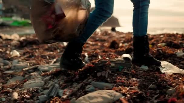 Volunteer Walks Dirty Beach Rubber Gloves Picks Garbage Puts Plastic — Stock Video