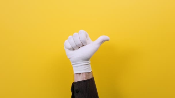 Mano Hombre Guante Blanco Muestra Gesto Pulgar Hacia Arriba Fondo — Vídeos de Stock