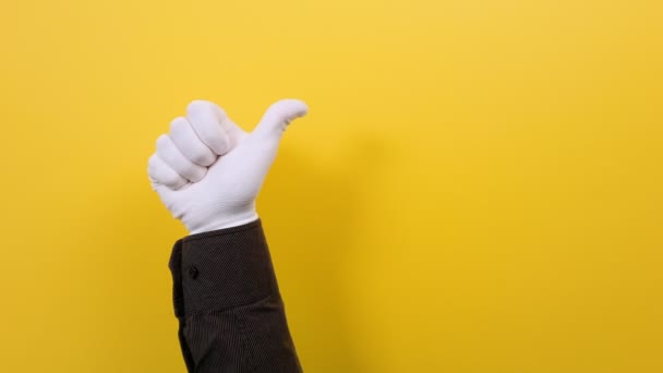 Mano Hombre Guante Blanco Muestra Gesto Pulgar Hacia Arriba Fondo — Vídeos de Stock