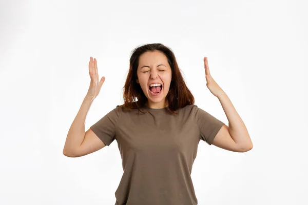 Young Woman Screams Her Arms Outstretched White Background Concept Human — Stock Photo, Image