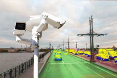 The concept of video surveillance and security technology. A surveillance camera monitors the violators of traffic rules. In the background, the road of different congestion. clipart