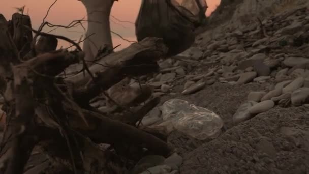 Woman Rubber Gloves Puts Dirty Plastic Bottle Bag Continues Cleaning — Stock Video