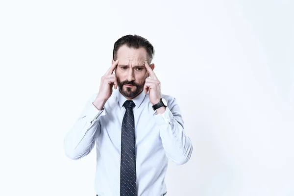 A man in shirt and tie stands on a white. — Stock Image A man in shirt and tie stands on a white. Stock Image
