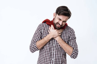 Man stands with sore throat and feels severe pain. clipart