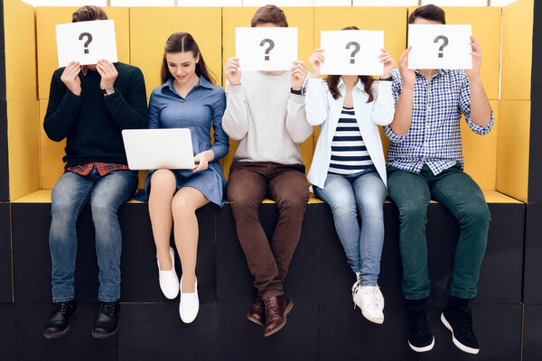 Girl sitting with a laptop in her hands. 
