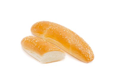 One whole and one half bun, sprinkled with sesame seeds