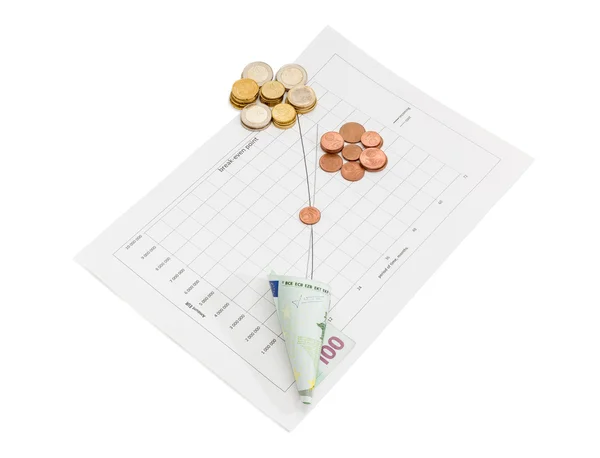 Euro coins and banknote on the line chart — Stock fotografie