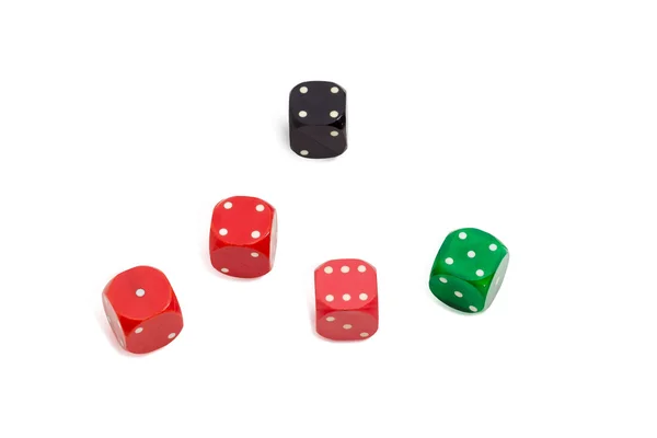 Old plastic multi colored six-sided dice with rounded corners — Stock Photo, Image