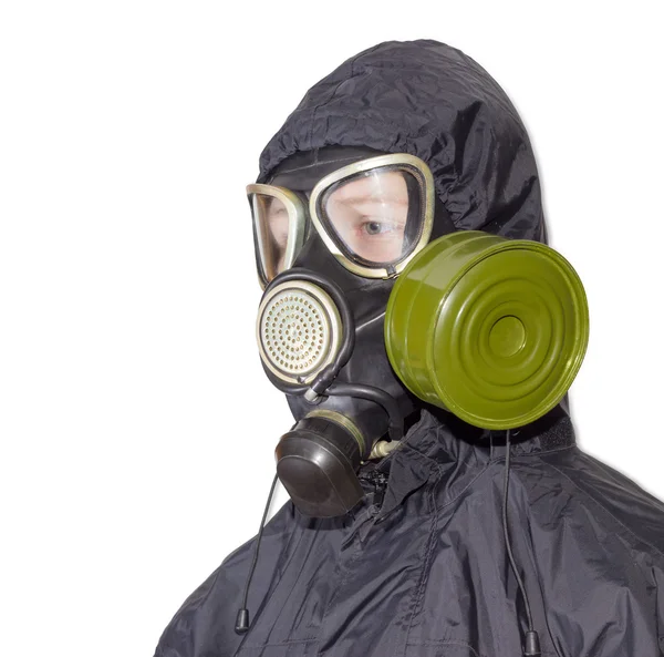 Pessoa em uma máscara de gás em um fundo leve — Fotografia de Stock