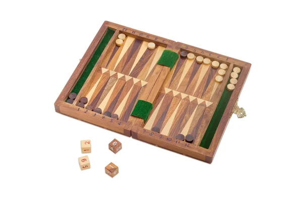 Miniaturní cestovní backgammon na světlém pozadí — Stock fotografie