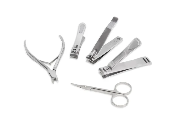 Several nail clippers different types and sizes and nail scissor — Stock Photo, Image