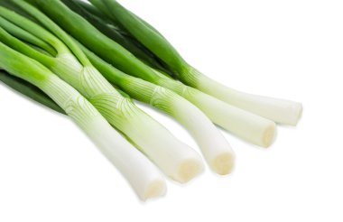 Green onion on a light background closeup clipart