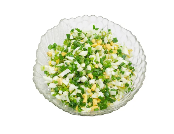 Salát ze zelené cibulky s vejci na světlém pozadí — Stock fotografie