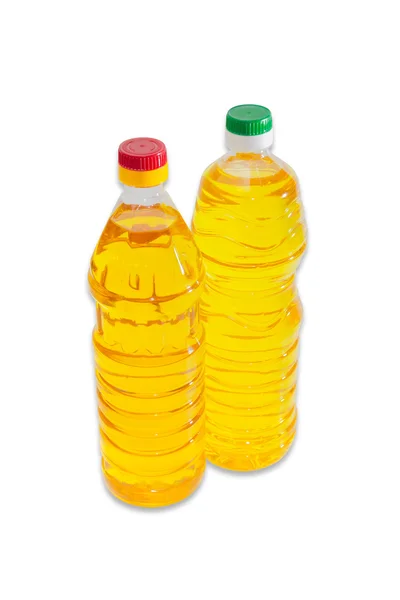 Dos botellas de aceite de girasol sobre un fondo claro —  Fotos de Stock
