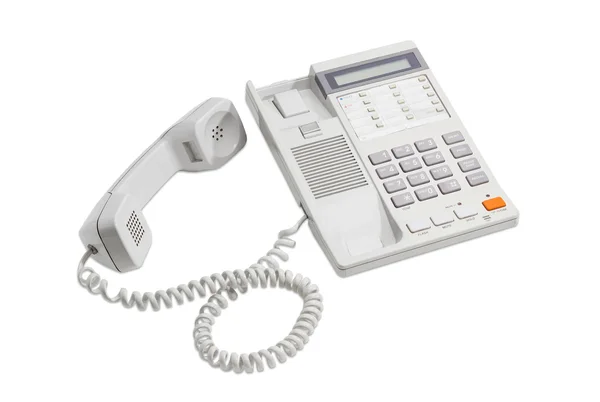 Landline telephone with push button dial on a light background — Stock Photo, Image