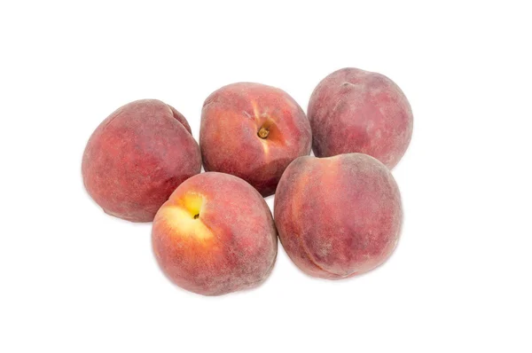 Beberapa buah persik dengan latar belakang cahaya — Stok Foto