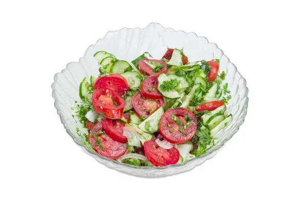 Ensalada con tomates y pepinos frescos en rodajas sobre fondo claro — Foto de Stock