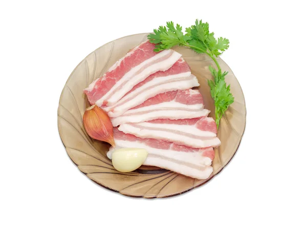 Okokt streaky bacon, vitlök och koriander kvist — Stockfoto