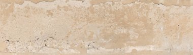 Fragment of the old concrete wall partly plastered, panoramic view close-up. Texture, background clipart
