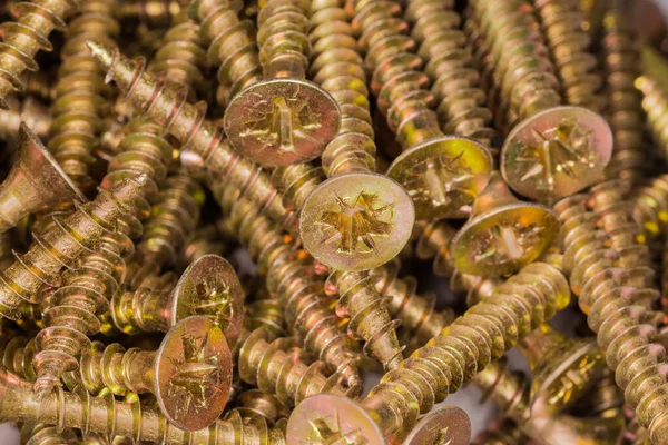 Pilha Parafusos Rosqueados Rebaixados Rebaixados Cruzados Com Revestimento Corrosão Amarelo — Fotografia de Stock