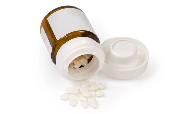 Białe Tabletki Kształcie Serca Brązowej Szklanej Butelce Otwartą Pokrywą Rozrzucone — Zdjęcie stockowe