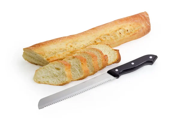 Fresh Partly Sliced Baguette Kitchen Knife Serrated Blade White Background — Stock Photo, Image