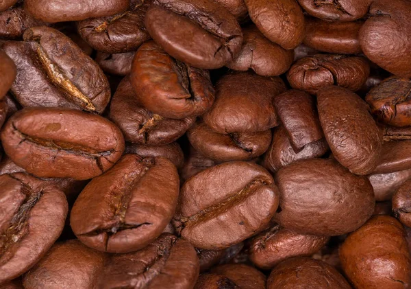 ローストコーヒー豆の山 フラグメントトップビュー 選択的フォーカス テクスチャのクローズアップ — ストック写真