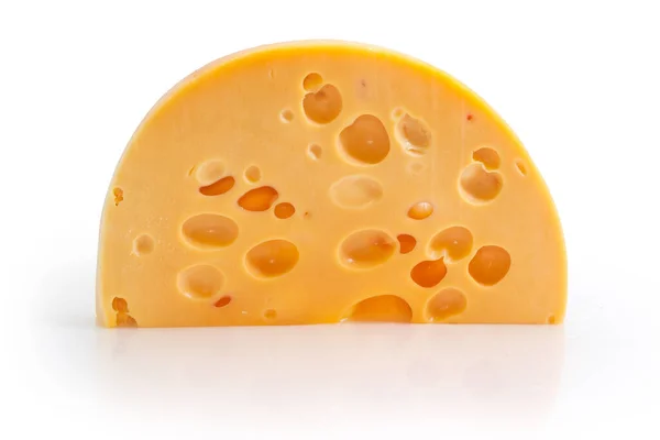 瑞士式奶酪的半圆形部分 有大洞 所以在白色的背景上被称为奶酪的眼睛 — 图库照片