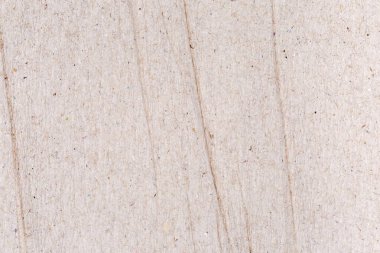 Gri kahverengi bir parça buruşmuş, beyazlatılmamış yumuşak krep kağıdı yakın plan, doku, arka plan.