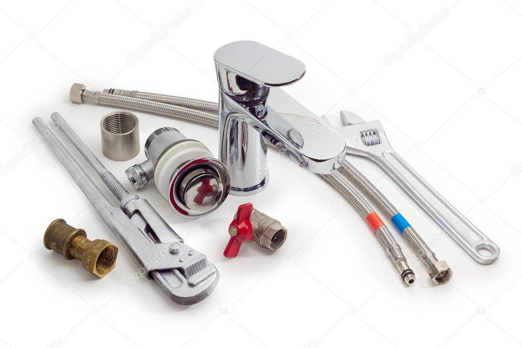 Plumber wrench, adjustable wrench,  handle mixer tap, reinforced hoses and other plumbing components on a white background